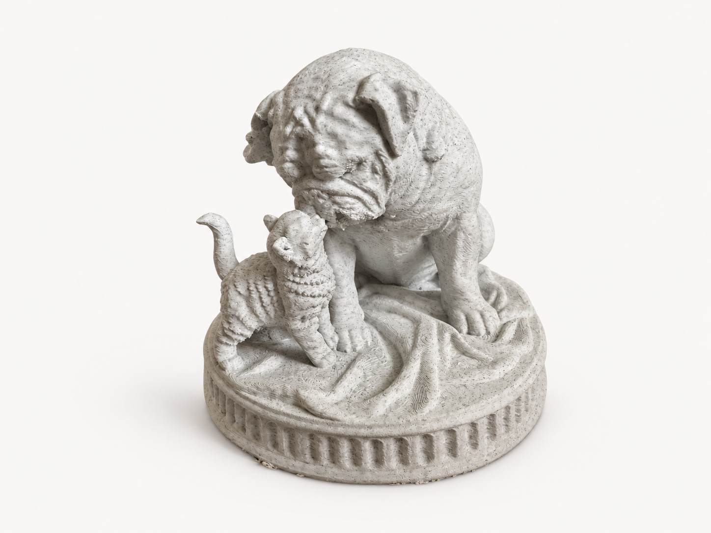 Light gray bulldog and kitten figurine touching noses on a round custom pedestal